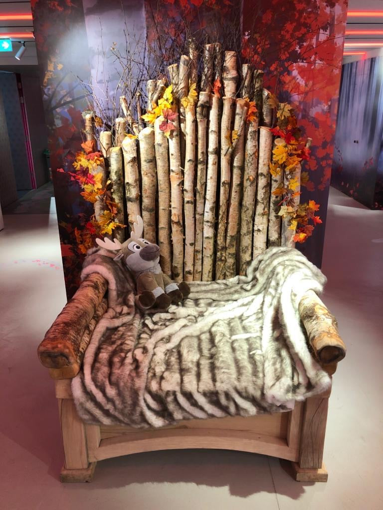 Wooden chair with birch branches and fur