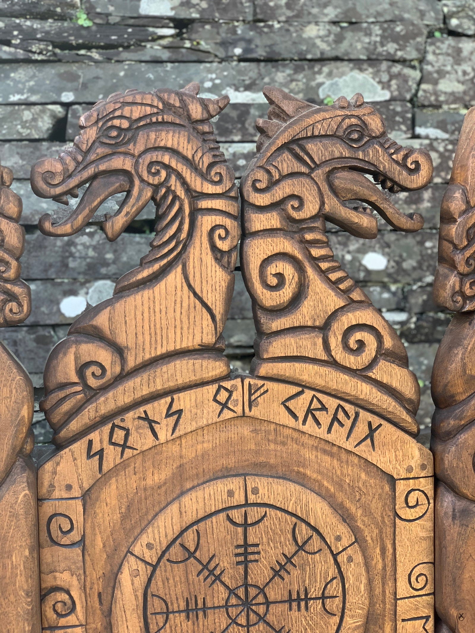 Close-up of dragon heads on Viking Throne Chair