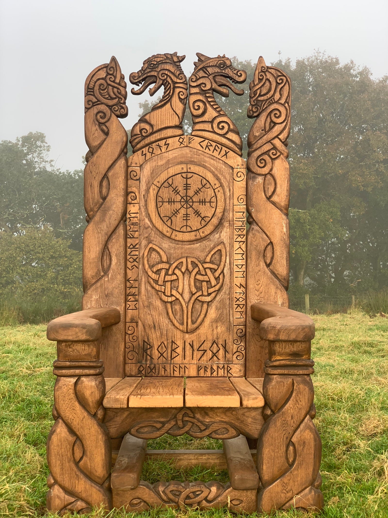 Front view of Viking chair with intricate carvings