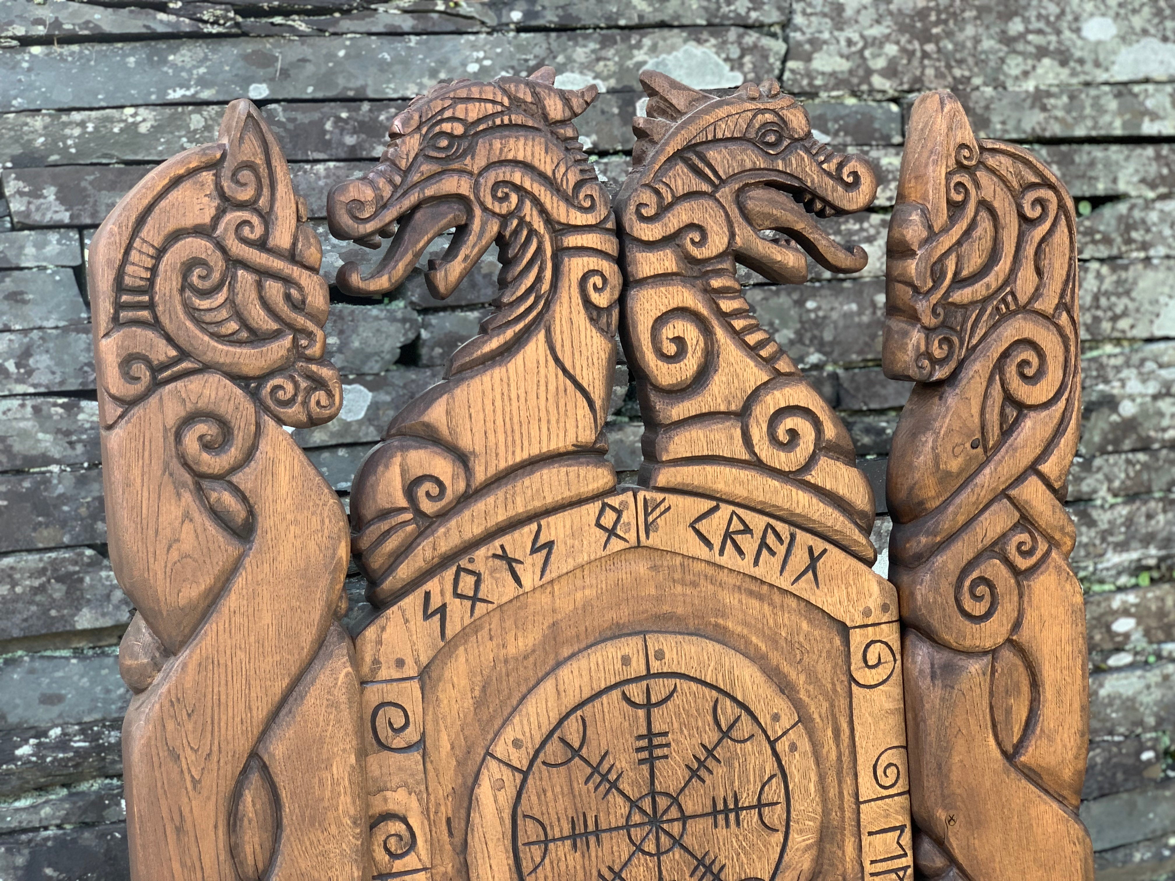 Close-up of dragon carvings on Viking throne