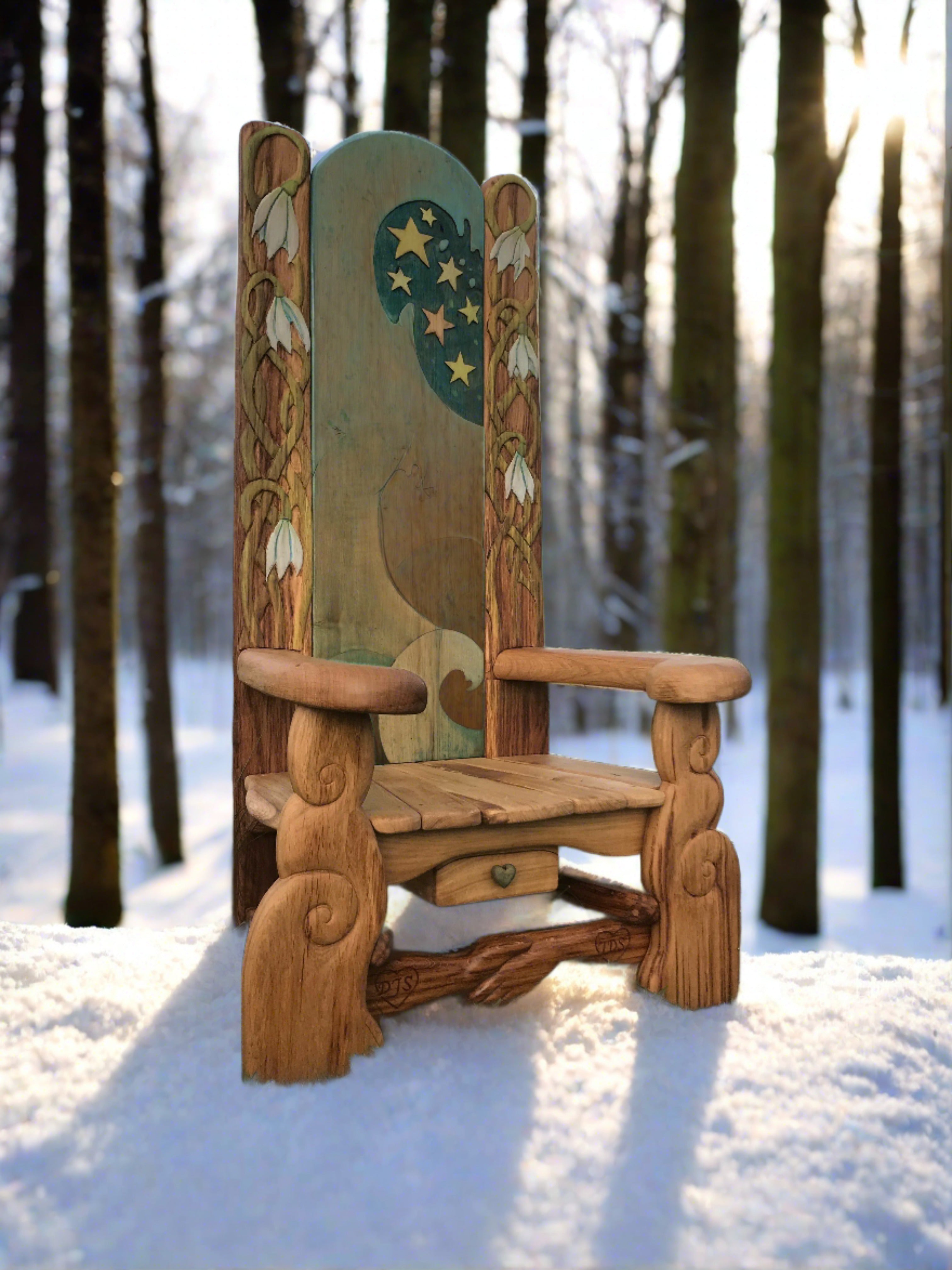 Magical wooden chair with stars and snowdrops