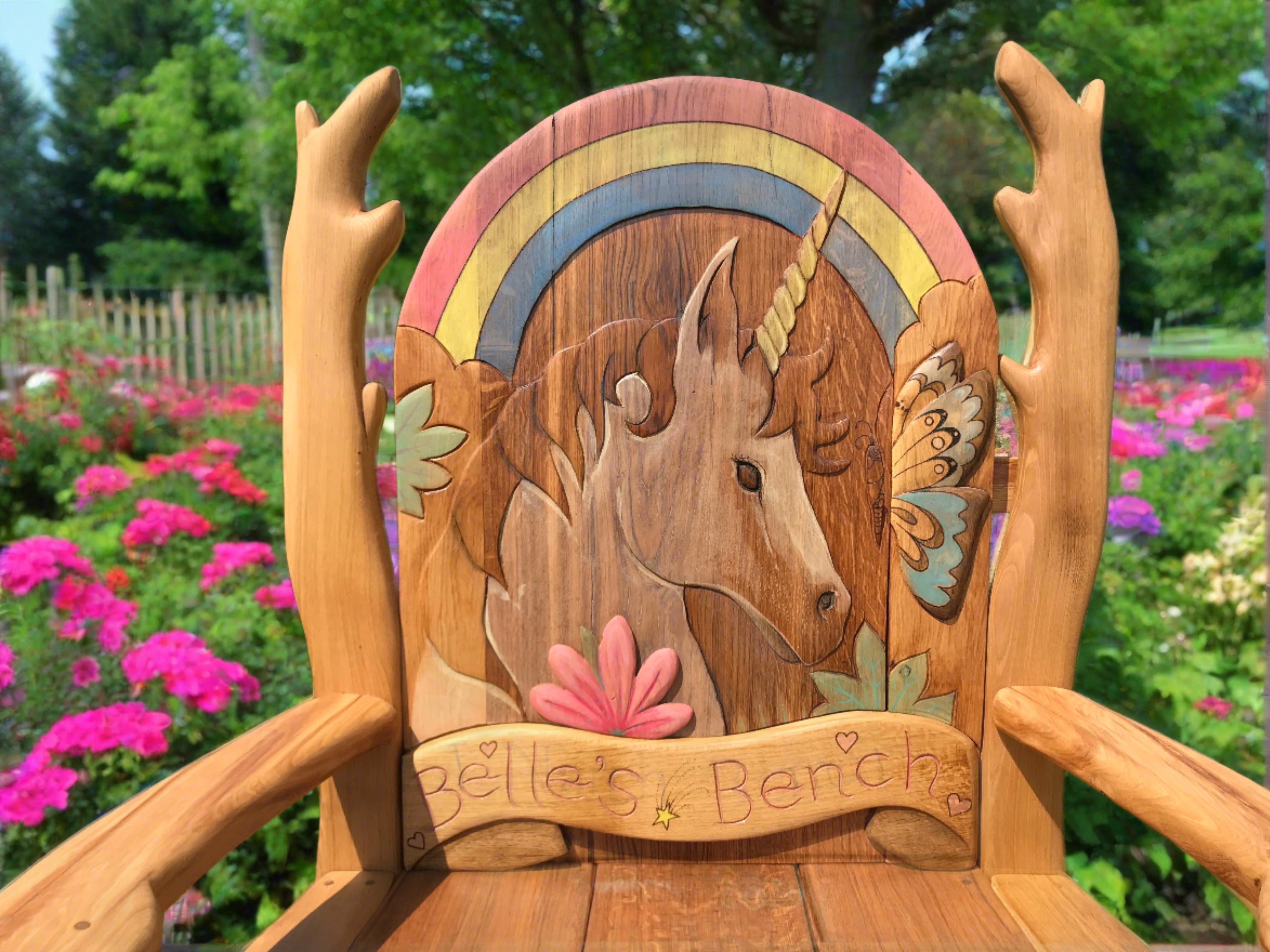 Unicorn carving on wooden bench with flowers