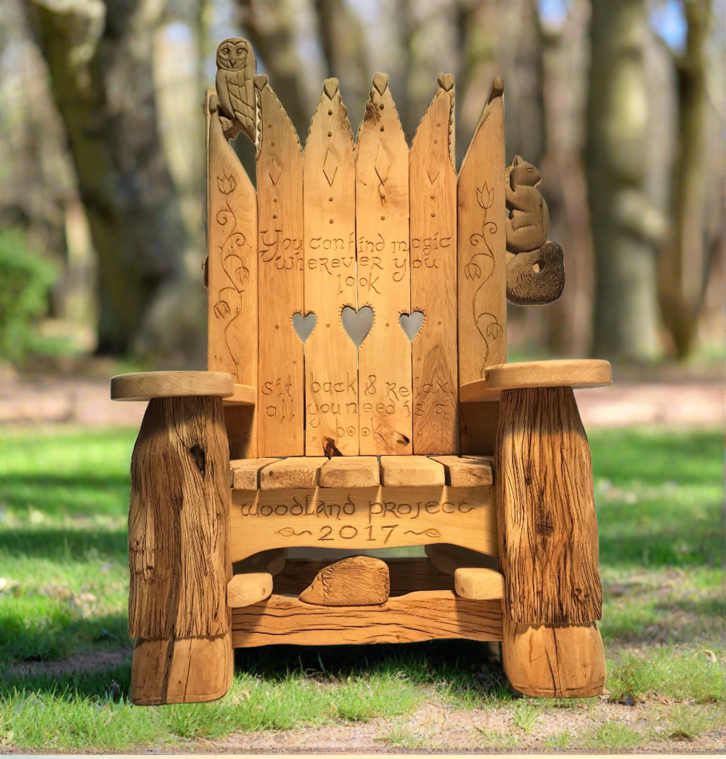 Wooden throne with heart cutouts and carvings