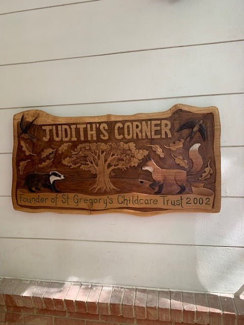 handcarved wooden sign